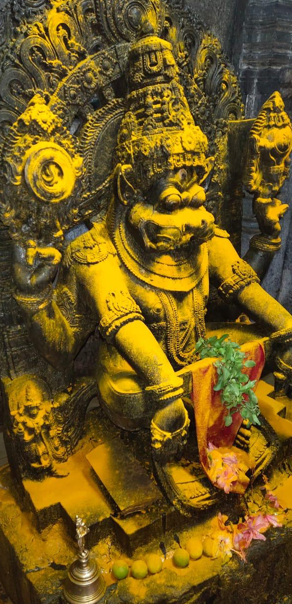 Yoga Narasimha anointed with turmeric, viewed from the right